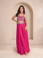 Magenta embellished crop top with choker drape, matching belt and palazzo