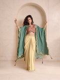 Sage green zari cutwork cape with embroidered maroon blouse and draped skirt