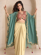 Sage green cape, blouse and draped skirt set, full length view