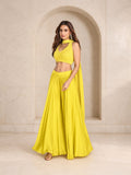 Sunny yellow halter crop top with choker neckline, attached drape and palazzo