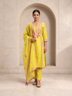 Radiant yellow Roman silk kurta set with pastel floral embroidery and mirror work